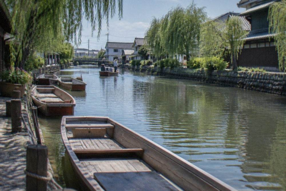 Wooden river boats moored along a canal in Yanagawa near Fukuoka