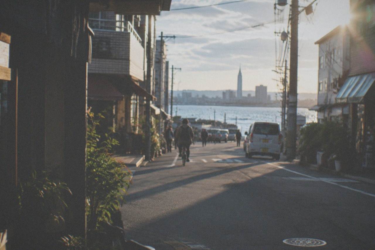 Fukuoka city skyline across Hakata Bay with the Genkai Sea on the horizon