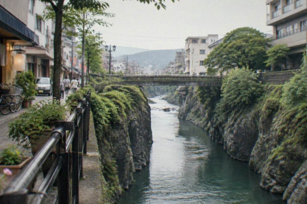 A narrow gorge with sheer basalt cliffs and a river running between them