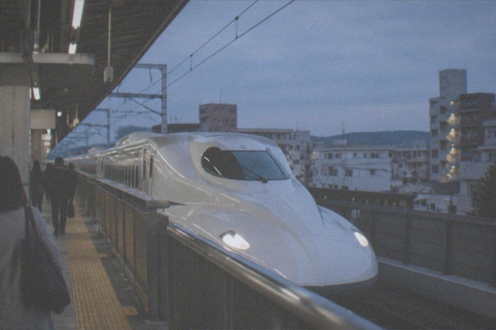 High-speed train platform at a large station in the morning