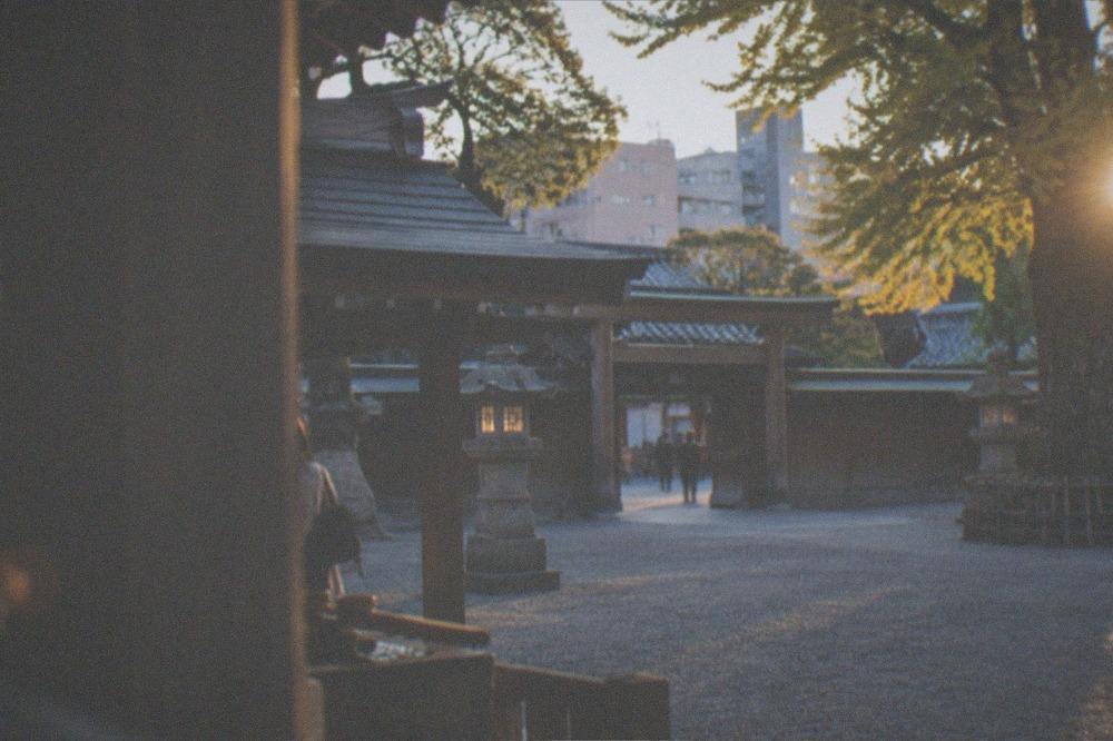 Kushida Shrine courtyard in soft evening light with lanterns