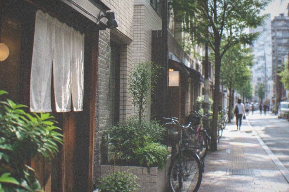 Modern hotel district streetscape near Hakata Station in the early morning