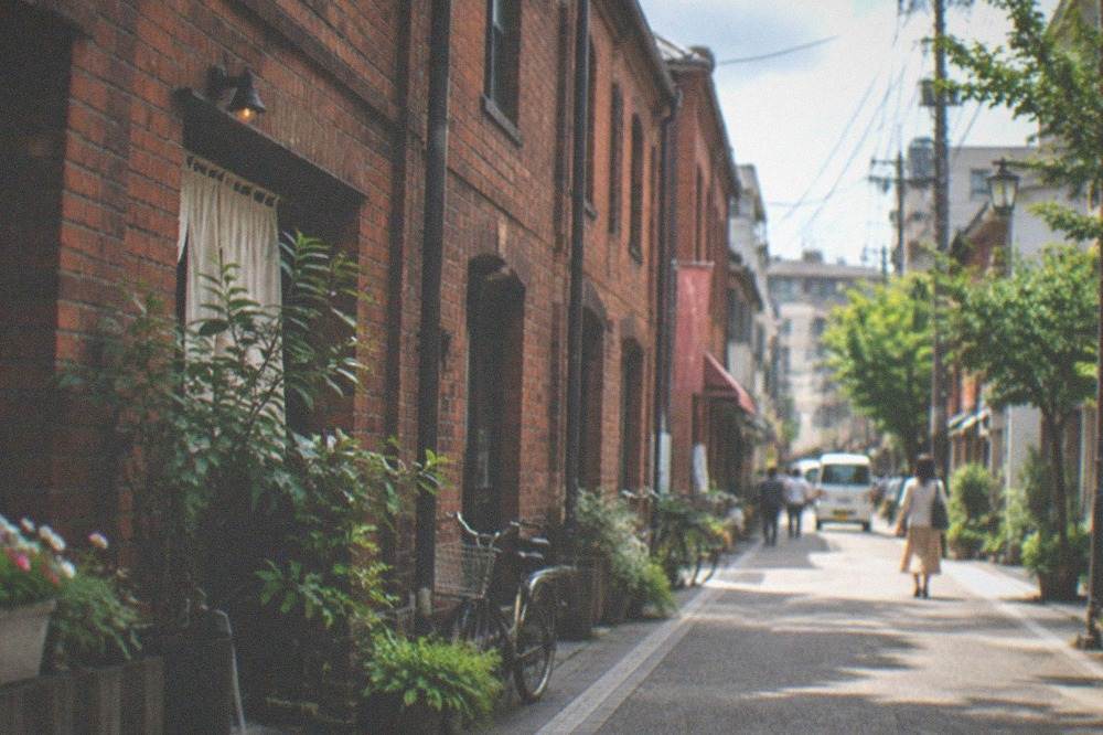 A red brick warehouse street in a historic Kyushu port town