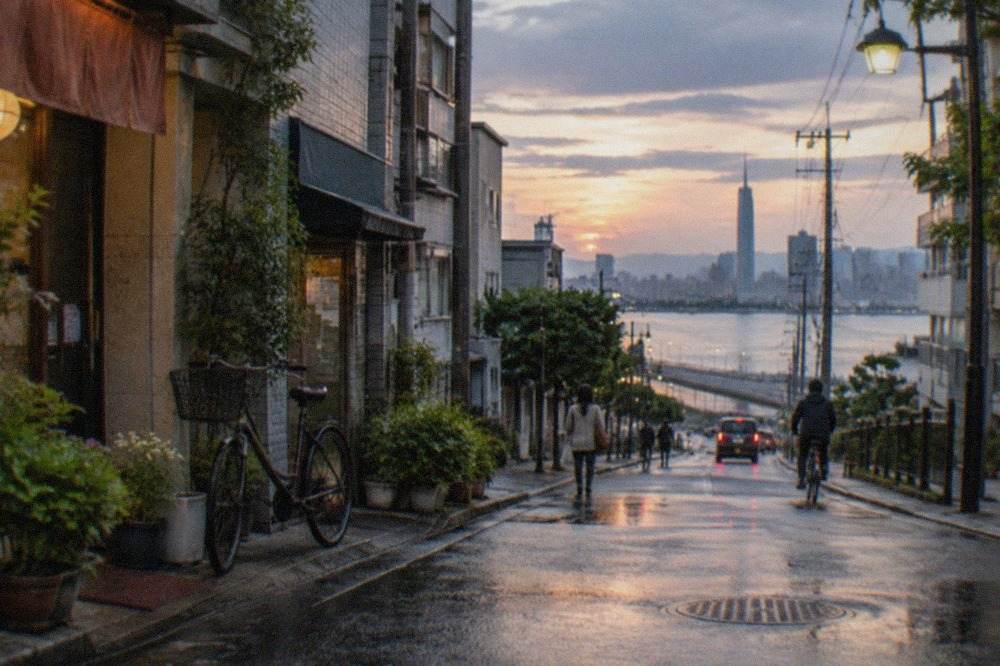 Fukuoka city skyline at dusk with tall buildings along the waterfront