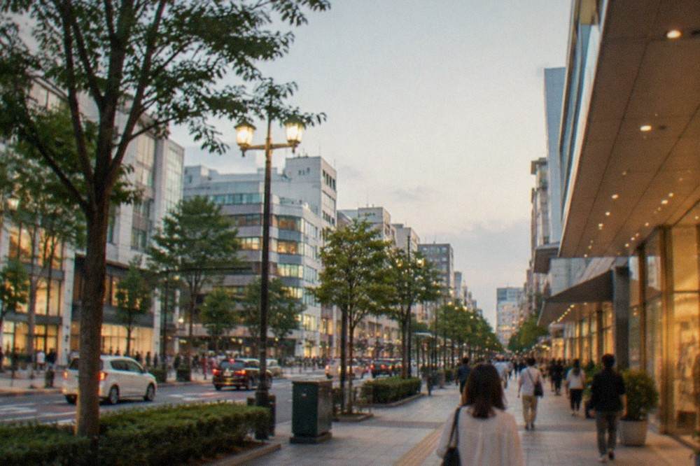 Illuminated shopping streets and storefronts in the Tenjin district at night